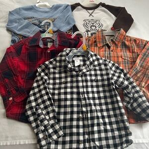 A bundle of baby tops.